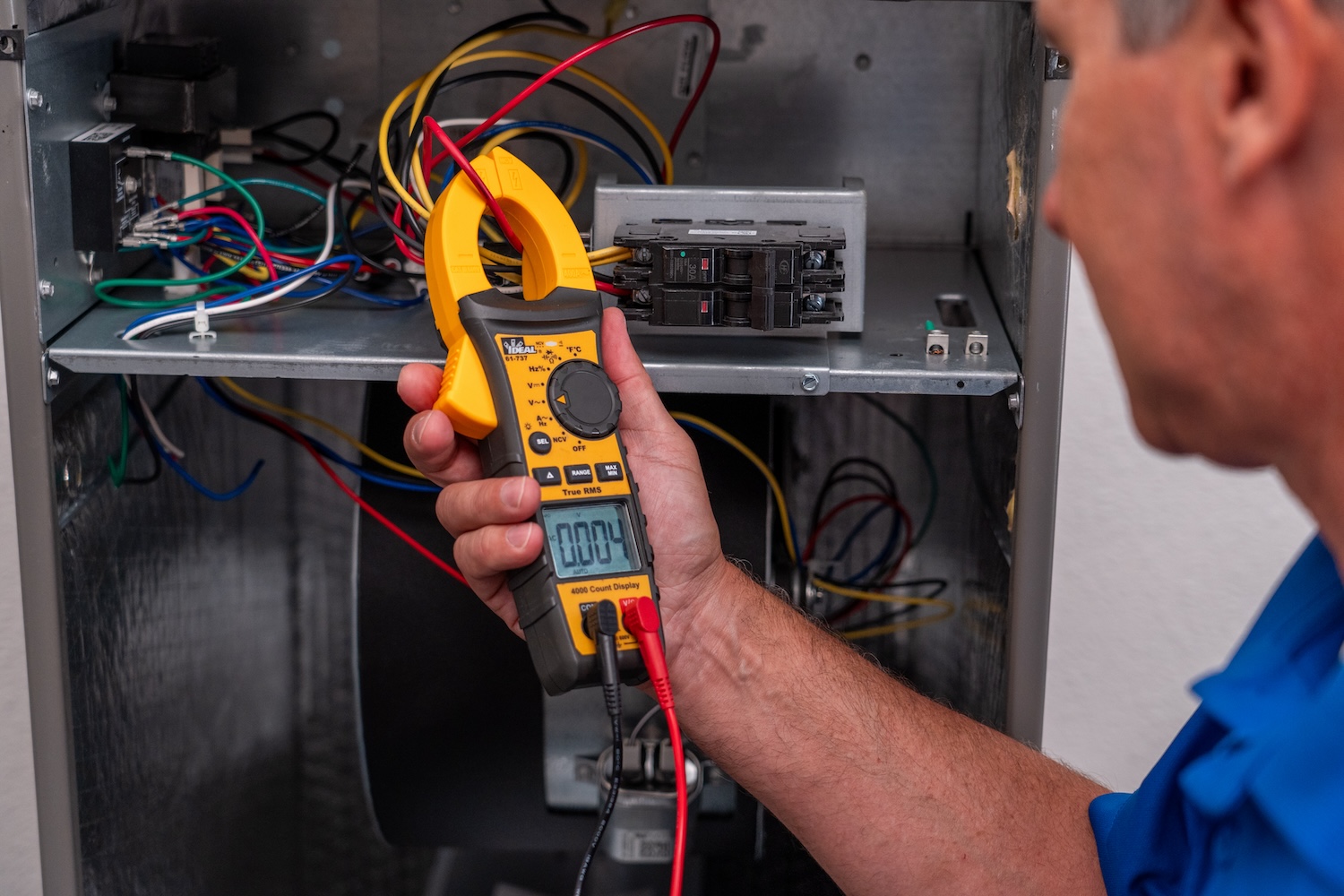 technician inspecting equipment